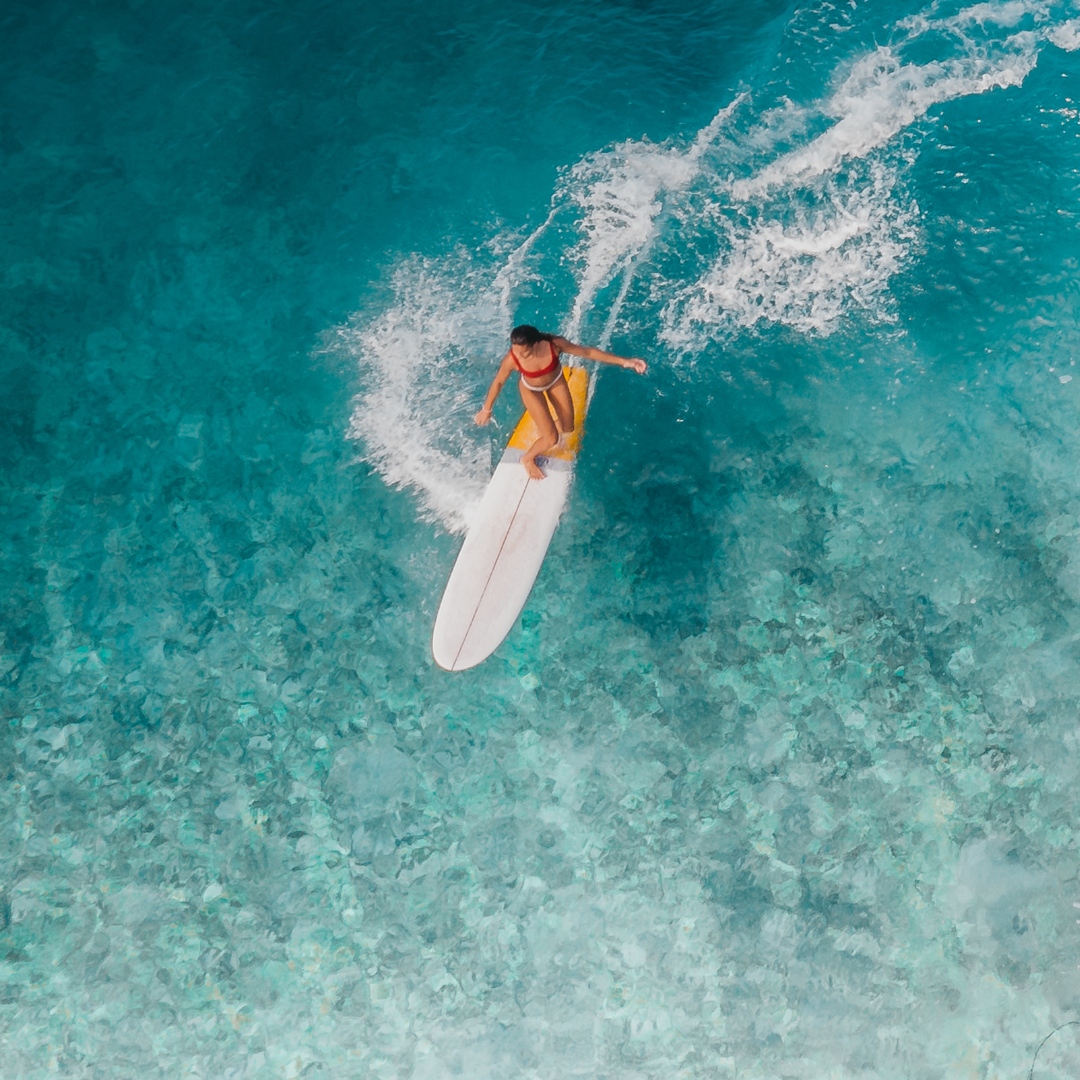 Surf & Soul retreat. Girl Surfing.