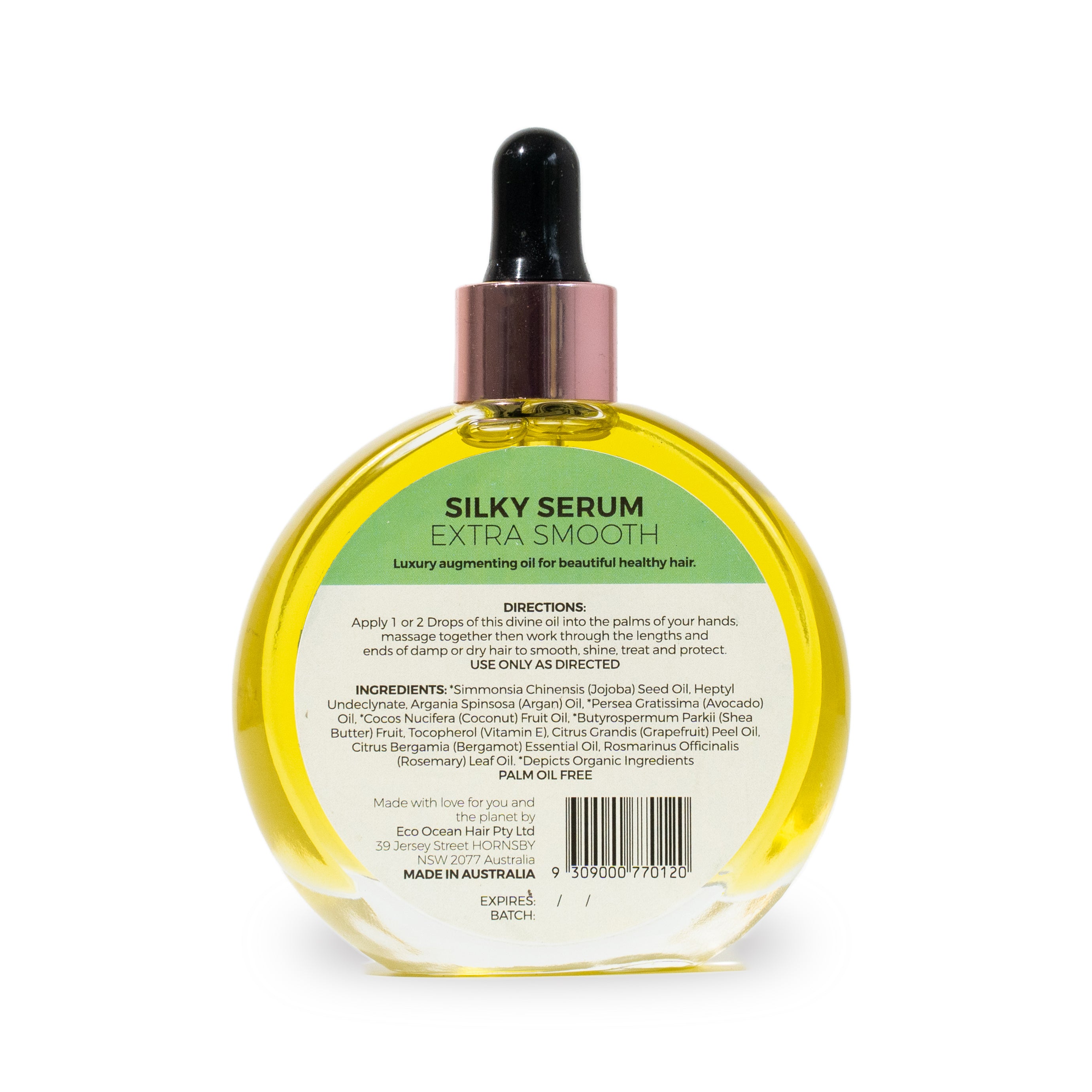 Glass bottle of silky serum extra smooth hair drops by Eco Ocean Haircare.