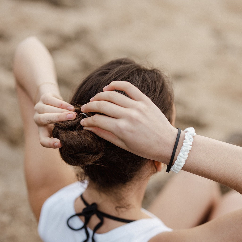 Woman using hair fork in her hair